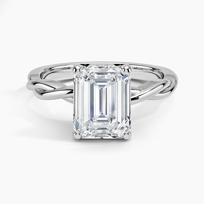 Emerald cut lab grown diamond solitaire ring in white gold on a braided rope twist band, top view