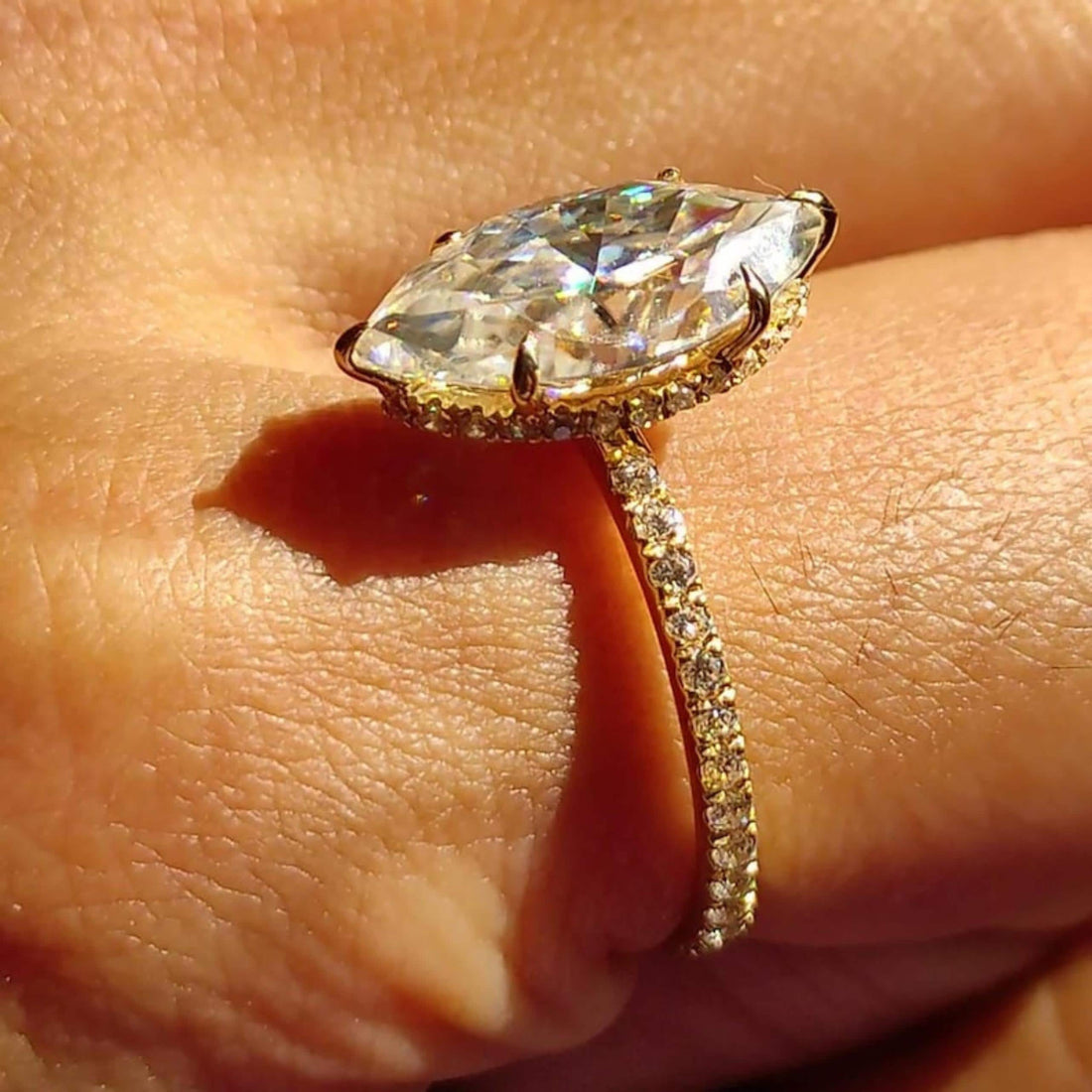 Marquise cut lab grown diamond hidden halo ring with pave set band