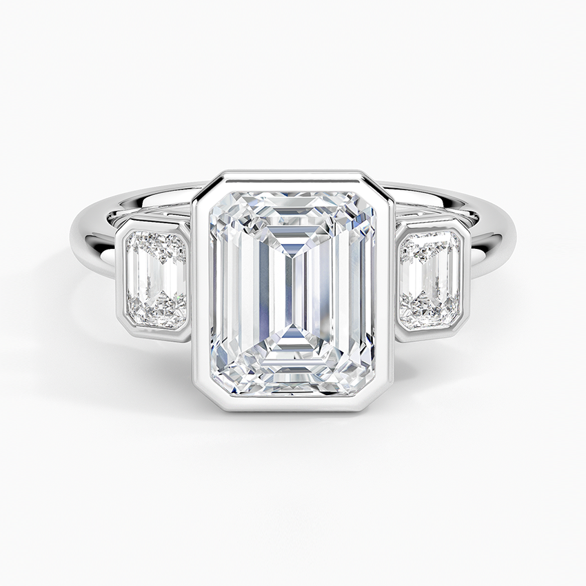 Emerald cut lab grown diamond ring in white gold with bezel set emerald cut side stones, top view