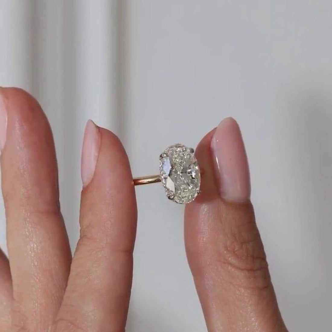 Oval cut lab grown diamond hidden halo classic solitaire ring