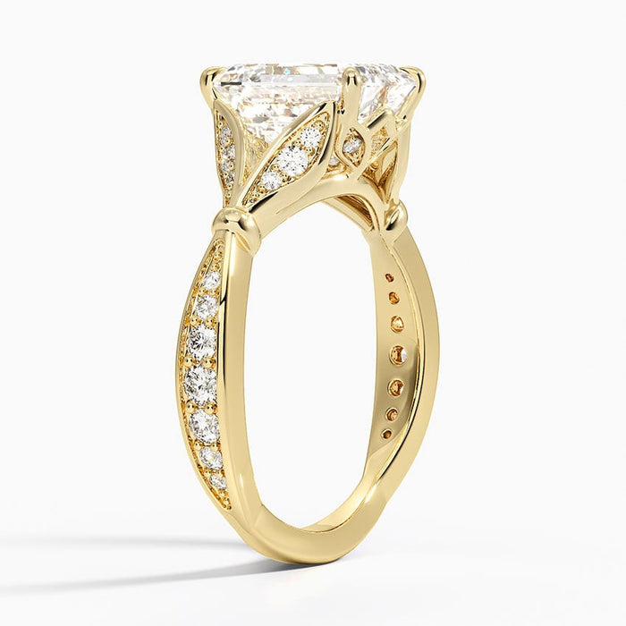 Side profile showing the carved leaf windows with pave diamonds and knife edge pave shoulder