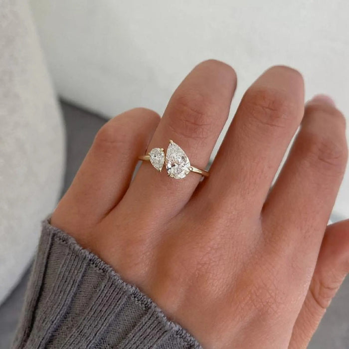 Pear and round brilliant lab grown diamonds set side by side