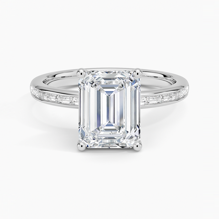 Emerald cut lab grown diamond ring with channel set baguette shoulders in white gold, top view