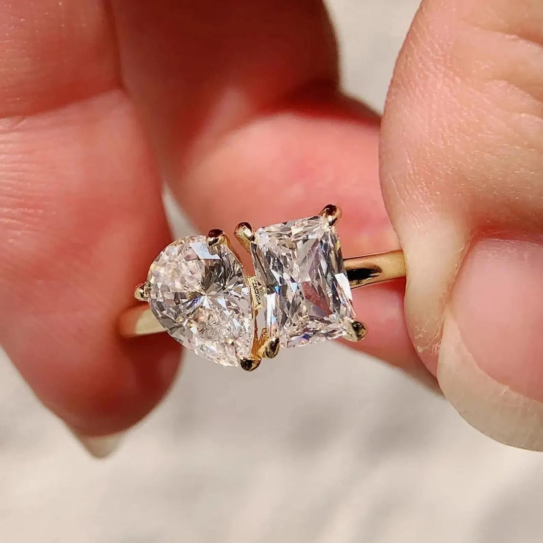 Toi et moi pear and radiant cut lab grown diamond engagement ring in yellow gold