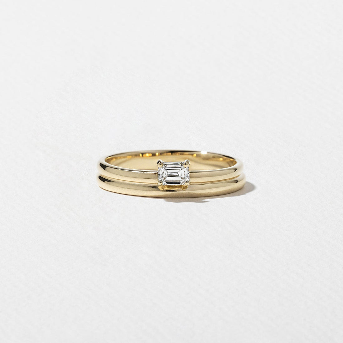 Emerald lab grown diamond single stone wedding band in yellow gold front view