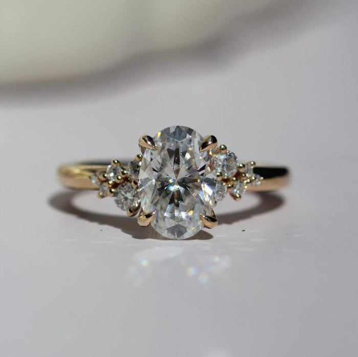 Oval cut moissanite solitaire engagement ring in 14K gold