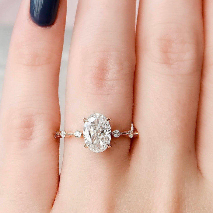 Oval moissanite four prong solitaire ring, front view