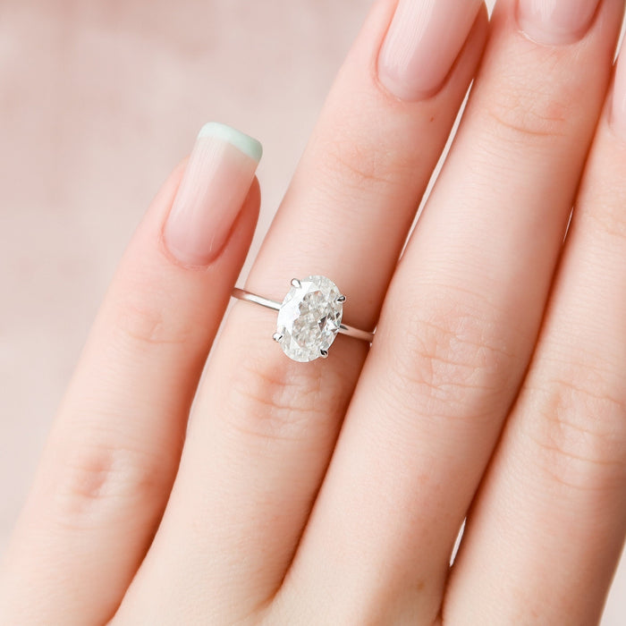 Oval Cut Moissanite Hidden Halo Engagement Ring - side view 2