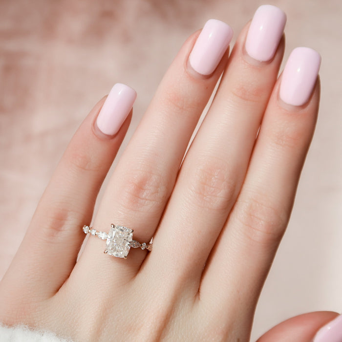 Elongated cushion moissanite hidden halo ring, front view