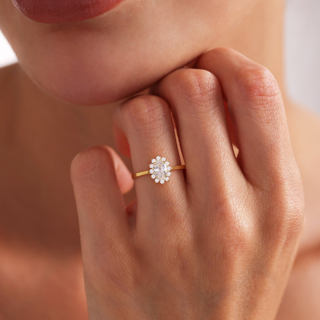 Oval Cut Moissanite Floral Halo Engagement Ring with Petal Style Halo and Thin Band - view 1