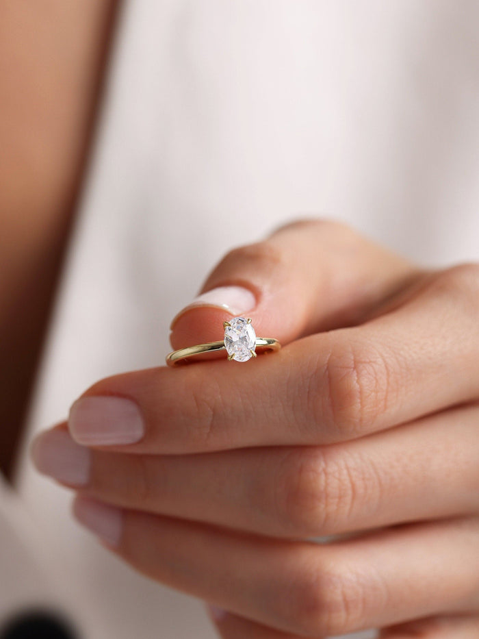 Delicate Oval Cut Moissanite Solitaire Engagement Ring with Fine Four Prong Setting - view 2