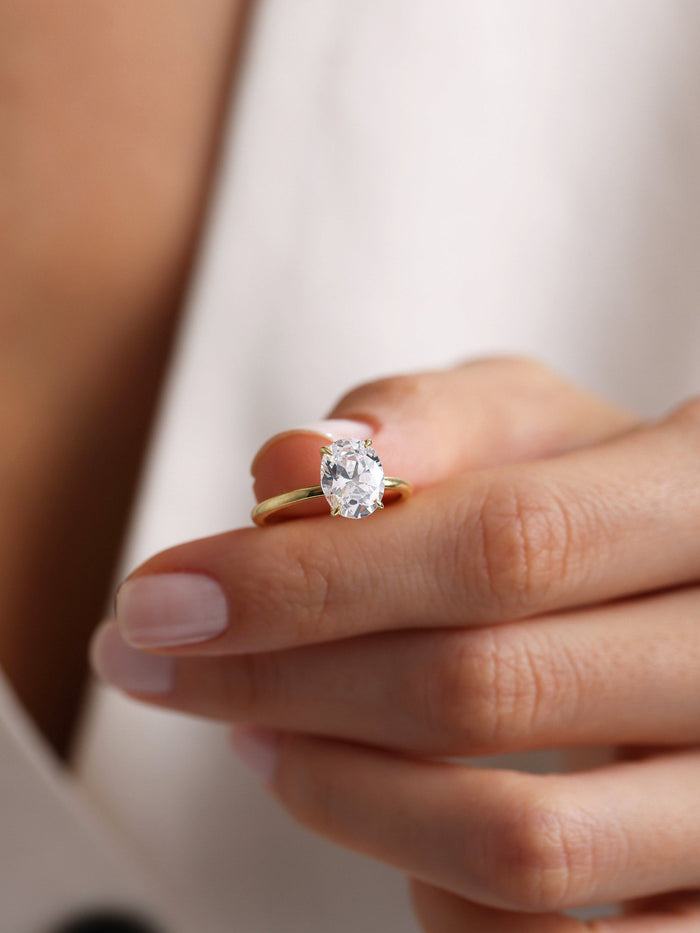 Classic Oval Cut Moissanite Four Claw Solitaire Engagement Ring with Thin Gold Band - view 2