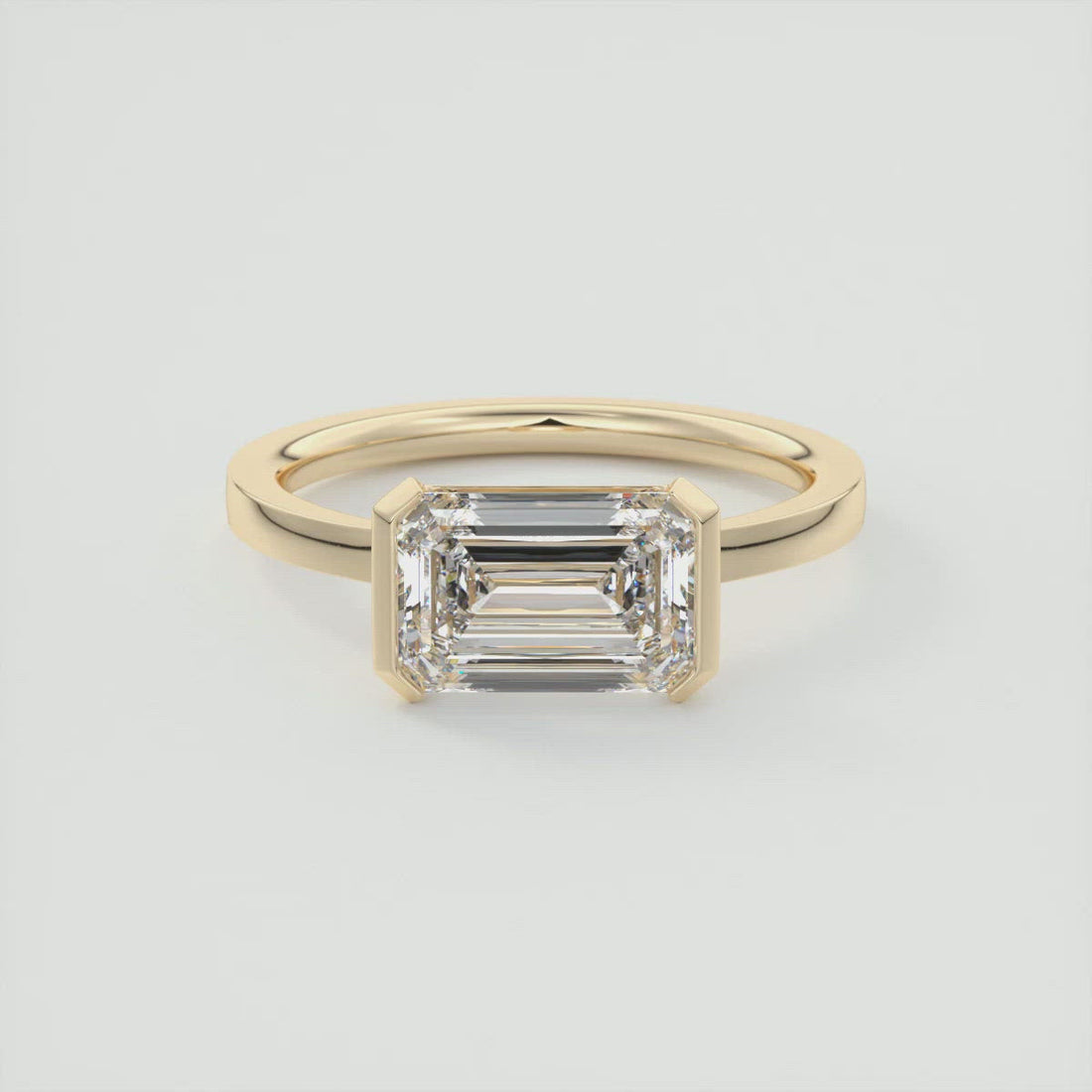 Emerald Cut Moissanite East West Bezel Engagement Ring 2 CT to 5 CT - front view 1