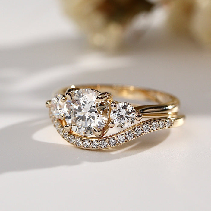 Angled view of the three stone ring with a nesting band, sold separately