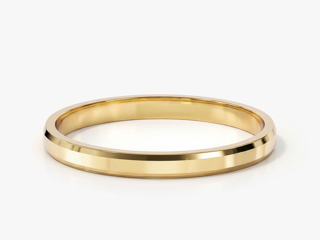 2mm beveled edge wedding band in polished yellow gold