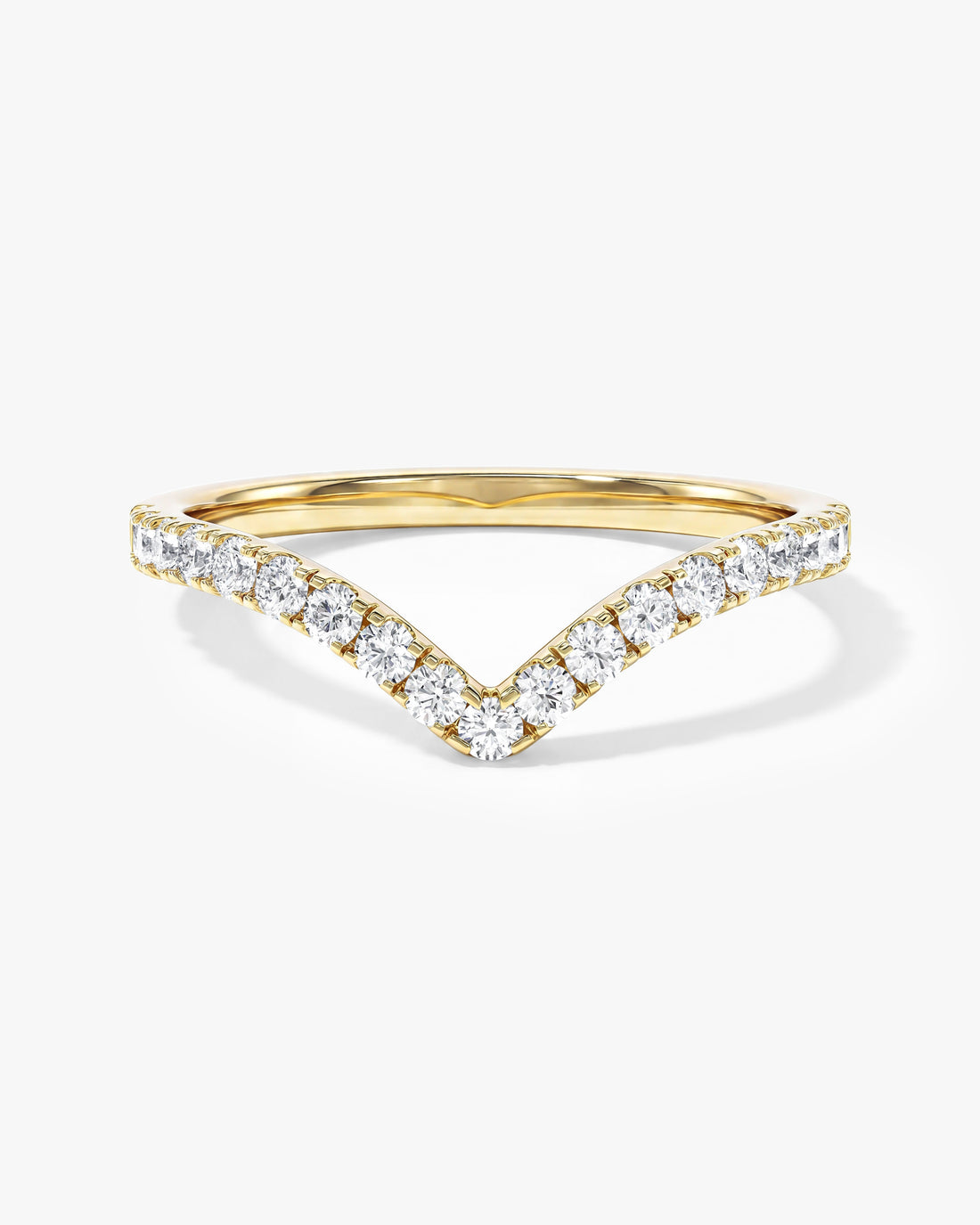 Curved round moissanite wedding band in yellow gold