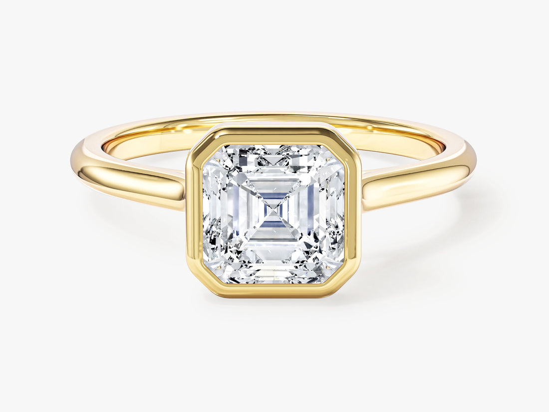 Art deco Asscher moissanite bezel set solitaire engagement ring in yellow gold, front view