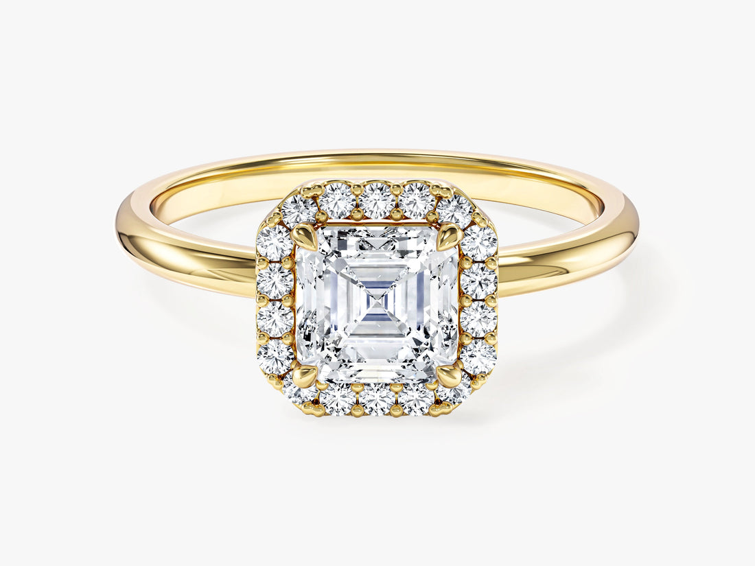 Dainty Asscher moissanite halo engagement ring with octagon frame in yellow gold, front view