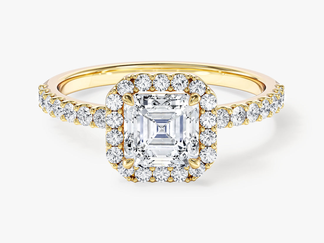 Asscher lab grown diamond four claw halo ring with micro pave shoulders in yellow gold, front view