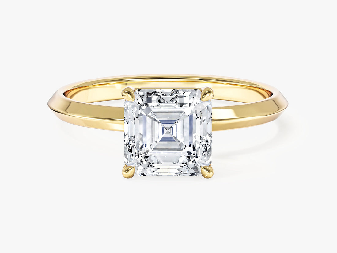 Asscher cut lab grown diamond engagement ring with knife edge band in yellow gold, front view showing talon prongs