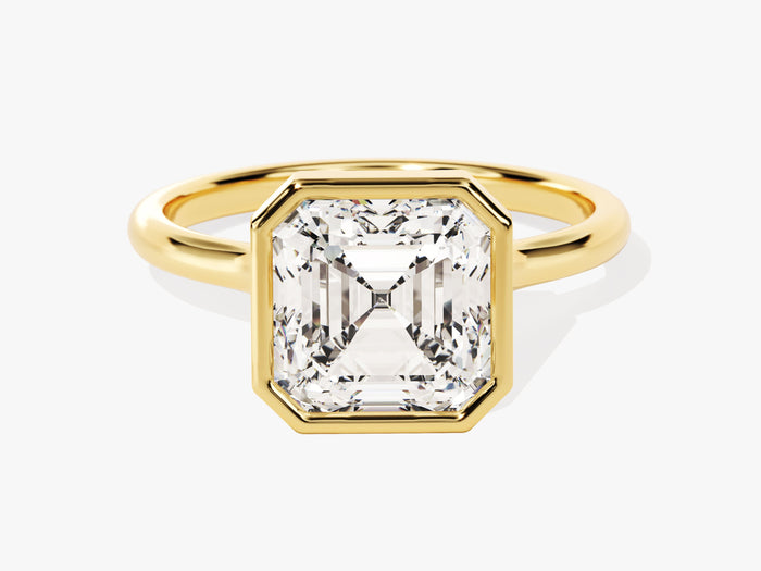 Large Asscher lab grown diamond bezel statement engagement ring in yellow gold, front view