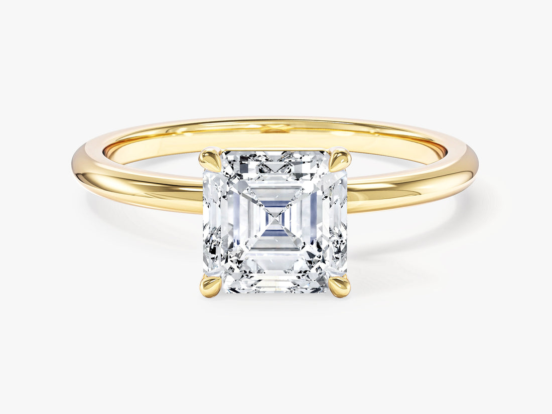 Classic Asscher lab grown diamond solitaire engagement ring with corner claws in yellow gold, front view
