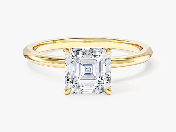 Classic Asscher lab grown diamond solitaire engagement ring with corner claws in yellow gold, front view
