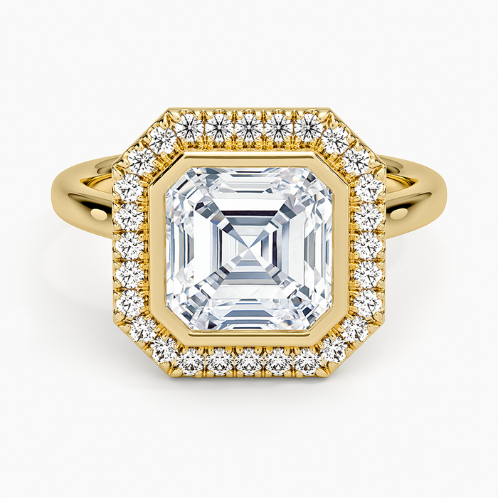 Asscher cut moissanite bezel set halo ring in yellow gold, top view