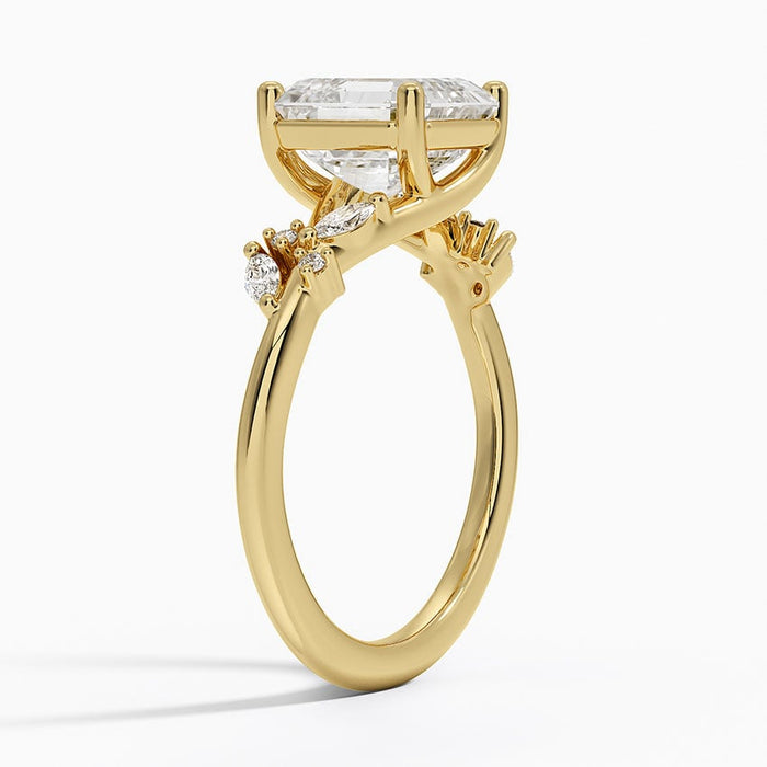 Side view showing marquise and round accents tilted on branching stems