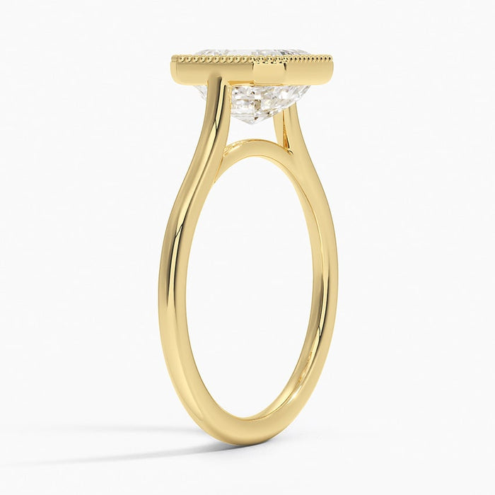 Side view showing the beaded milgrain rim and the slim tapered band