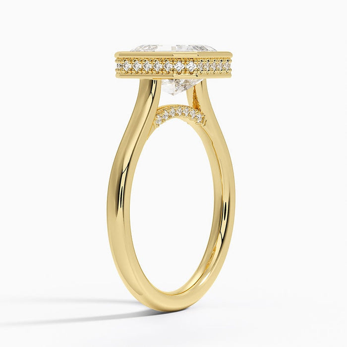 Side view showing pave set into the bezel wall between two milgrain lines