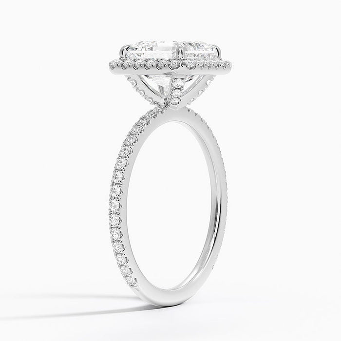 Side view showing pave continuing from halo down both shoulders