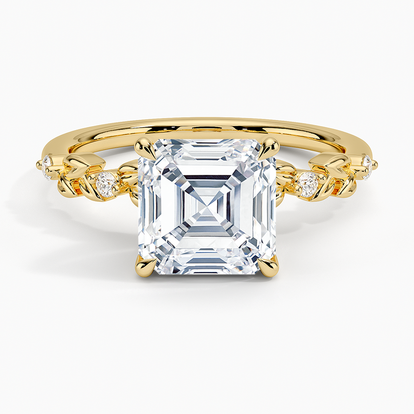Asscher cut moissanite ring with spaced accents and twisted leaf links in yellow gold, top view