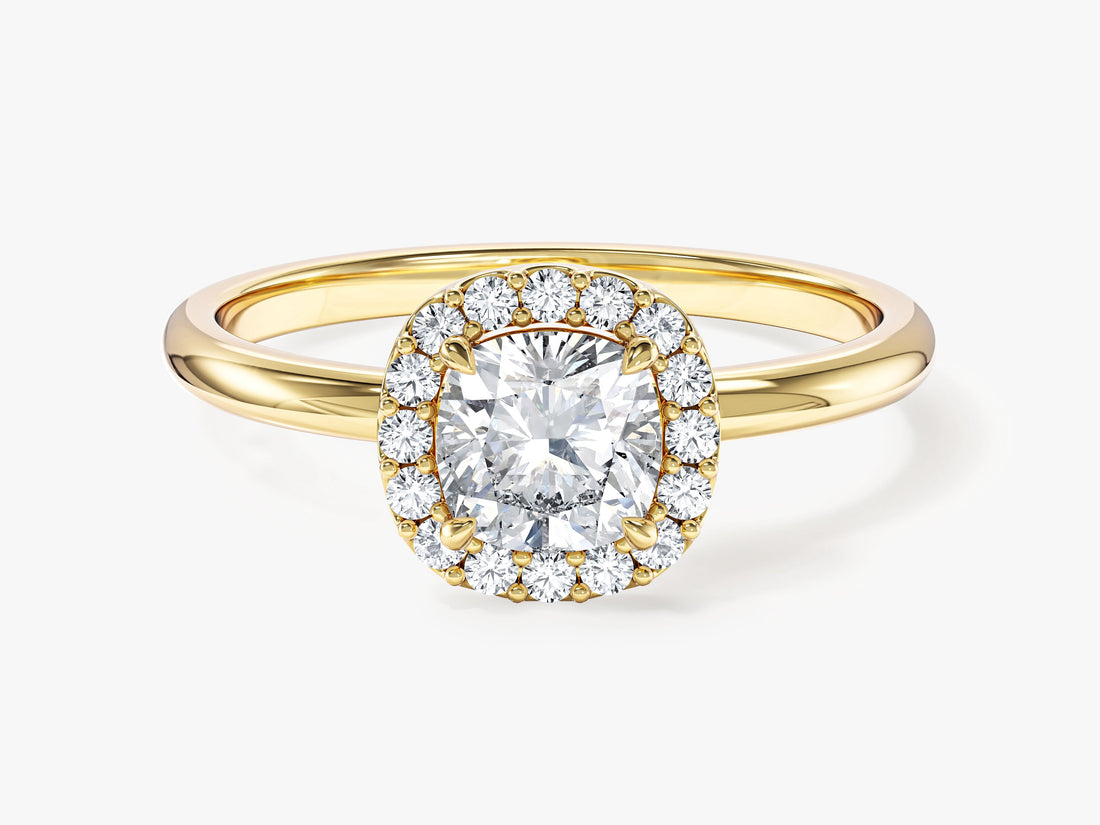 Dainty cushion cut moissanite halo engagement ring with slim plain band in yellow gold