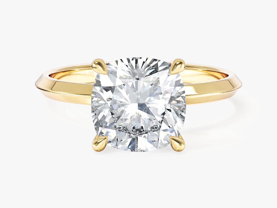 Large cushion cut moissanite knife edge statement engagement ring with talon claws in 14K yellow gold