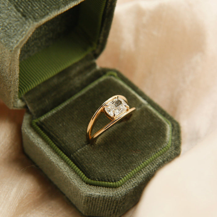 Cushion cut moissanite open split shank solitaire engagement ring in yellow gold