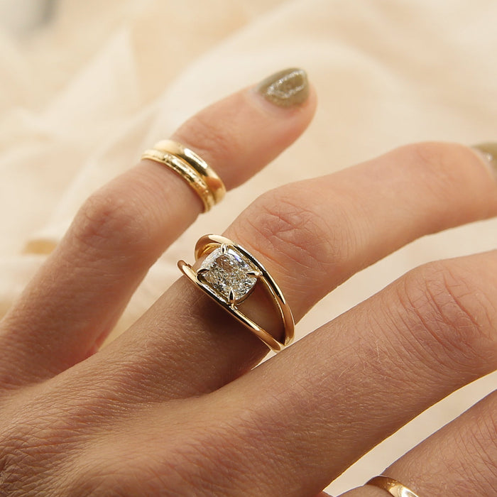 Cushion cut moissanite open split shank solitaire engagement ring in yellow gold, view 2