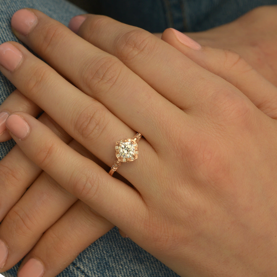 Cushion cut moissanite petite lobed vintage halo engagement ring in rose gold