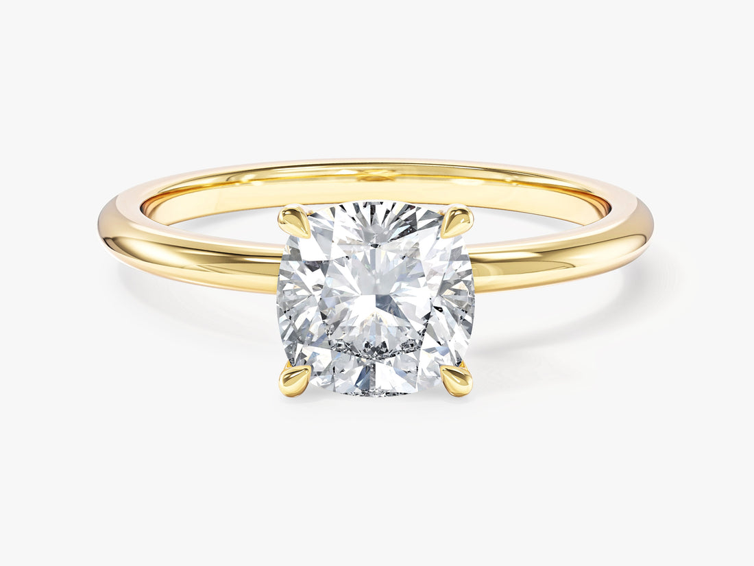 Cushion cut lab grown diamond four prong solitaire engagement ring in yellow gold, front view