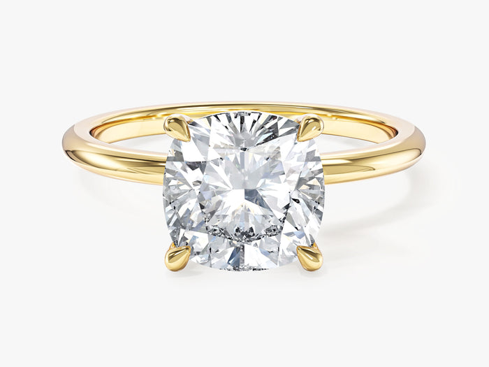 Large cushion cut lab grown diamond solitaire with teardrop prongs in yellow gold, front view