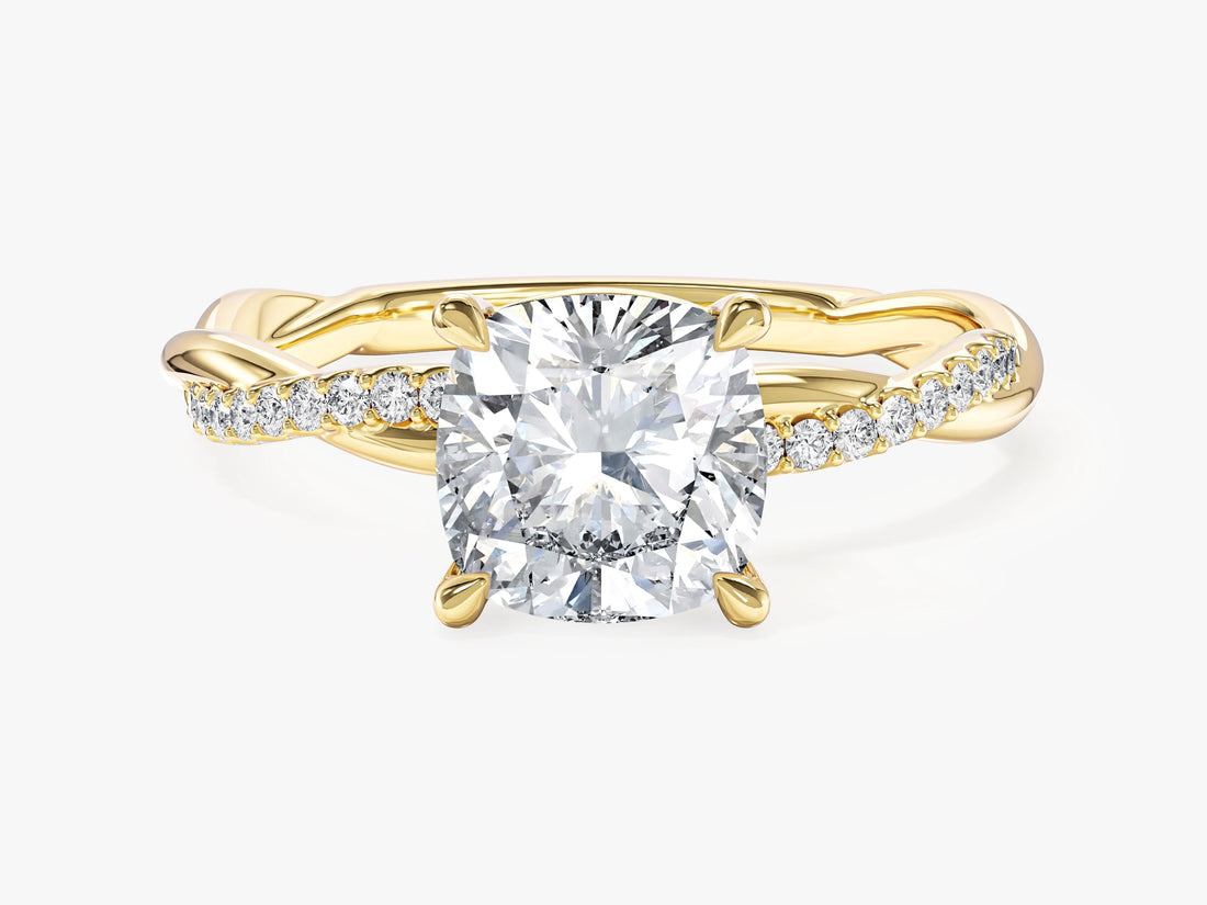 Cushion cut moissanite twisted pave engagement ring in 14K yellow gold, front view