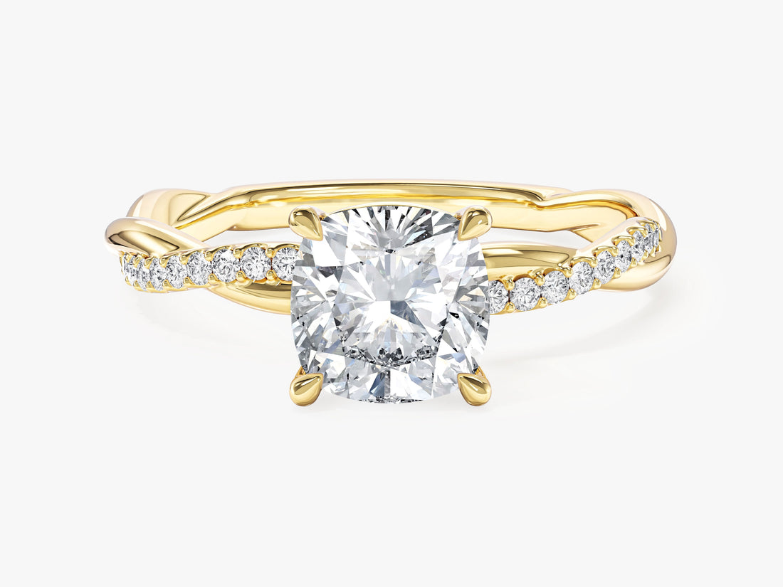 Cushion cut moissanite twisted pave engagement ring in 14K yellow gold, front view