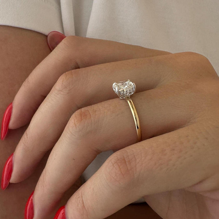 Cushion cut moissanite two tone solitaire engagement ring in white and yellow gold, view 2