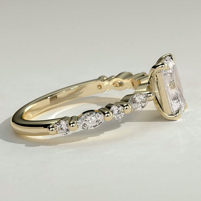 Emerald cut moissanite engagement ring with alternating marquise and round accents in yellow gold, view 2