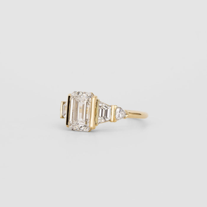 Emerald cut moissanite bar set five stone art deco engagement ring in yellow gold, view 2