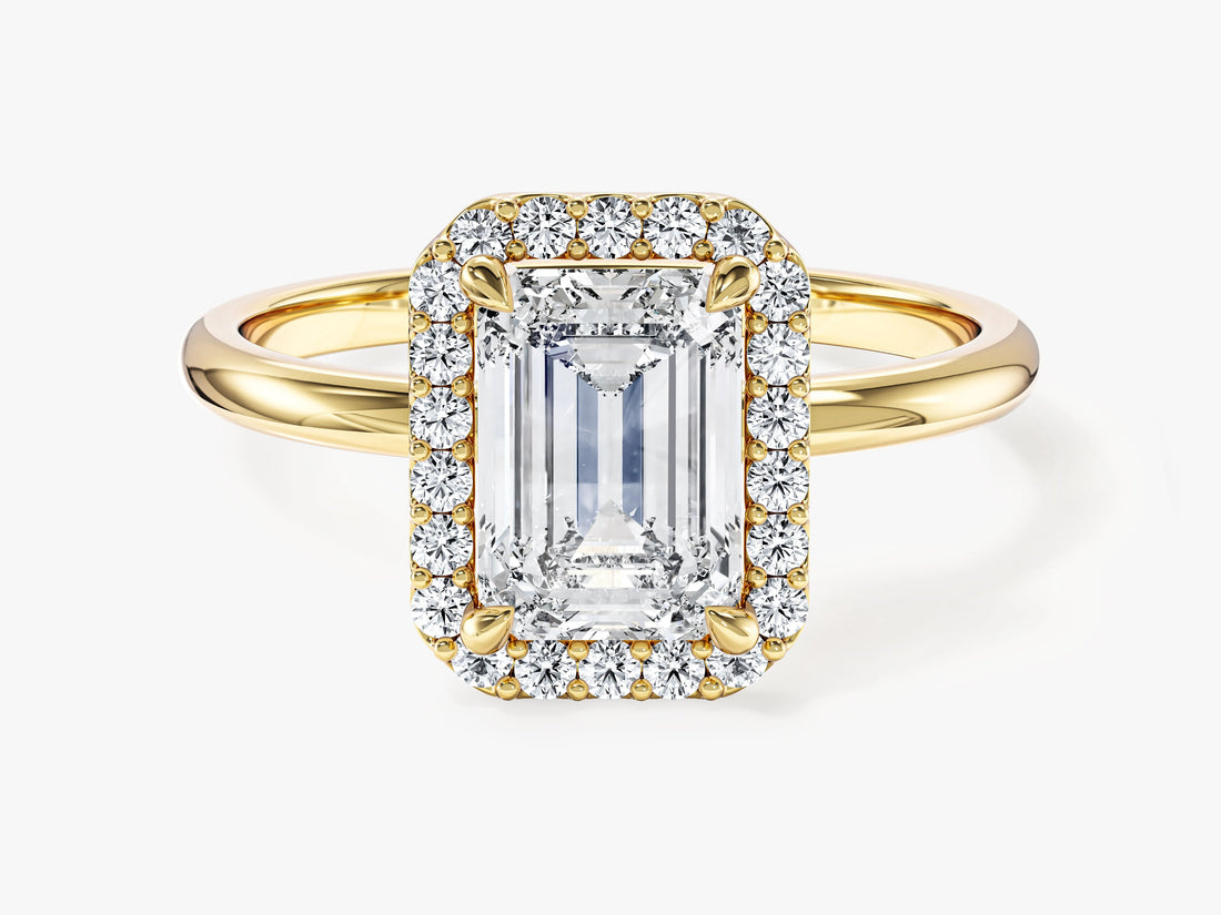 Emerald cut lab grown diamond halo engagement ring in yellow gold with plain band, front view