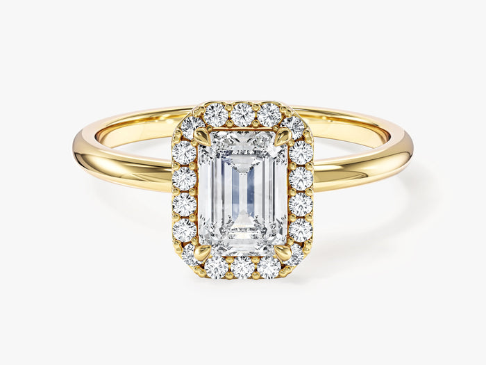 Rectangular emerald lab grown diamond micro prong halo engagement ring in yellow gold, front view