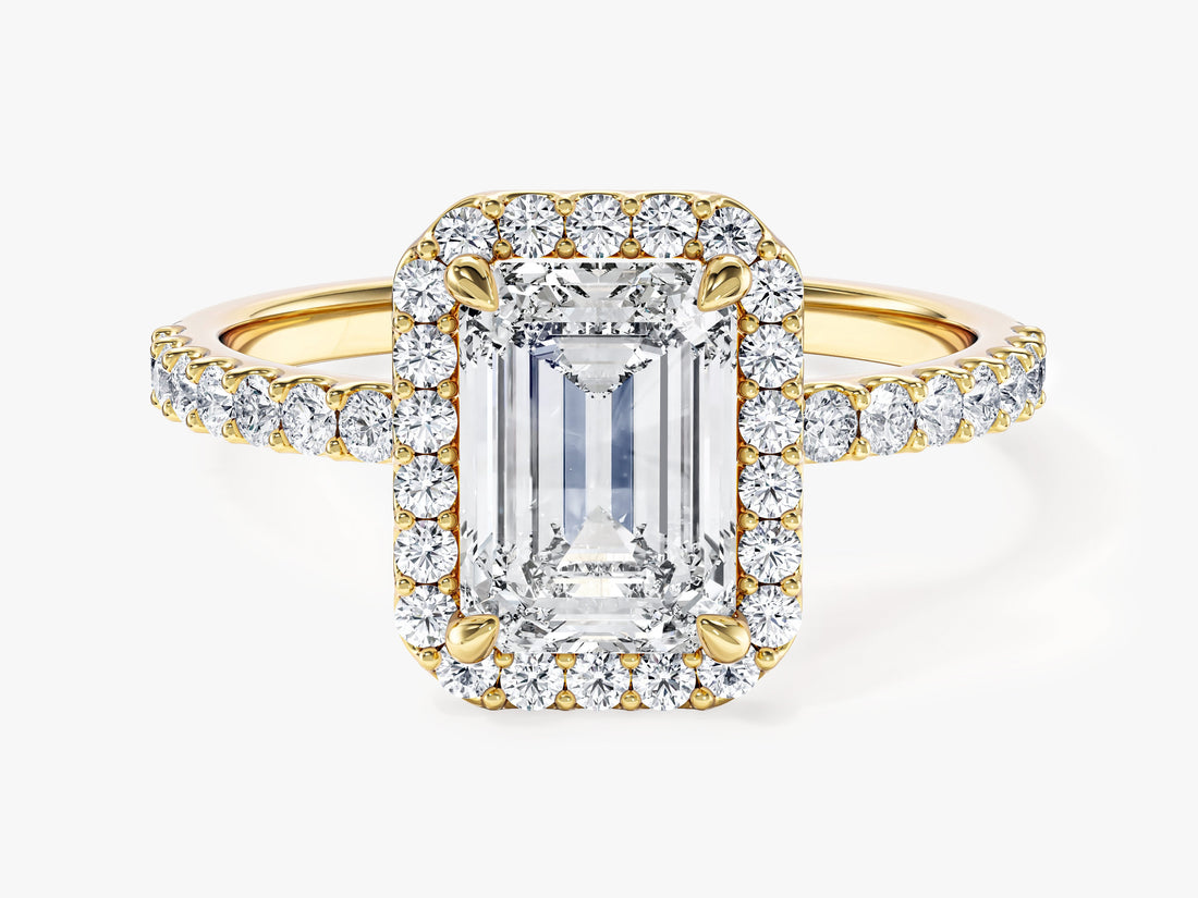 Emerald lab grown diamond rectangle halo ring with pave side stones in yellow gold, front view