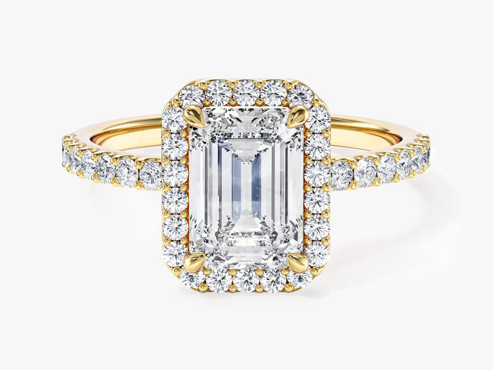 Emerald lab grown diamond rectangle halo ring with pave side stones in yellow gold, front view