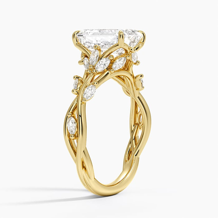 Side profile of the emerald cut moissanite twisted vine ring showing the braided gold shank